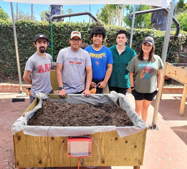 BOOST students with gardening project