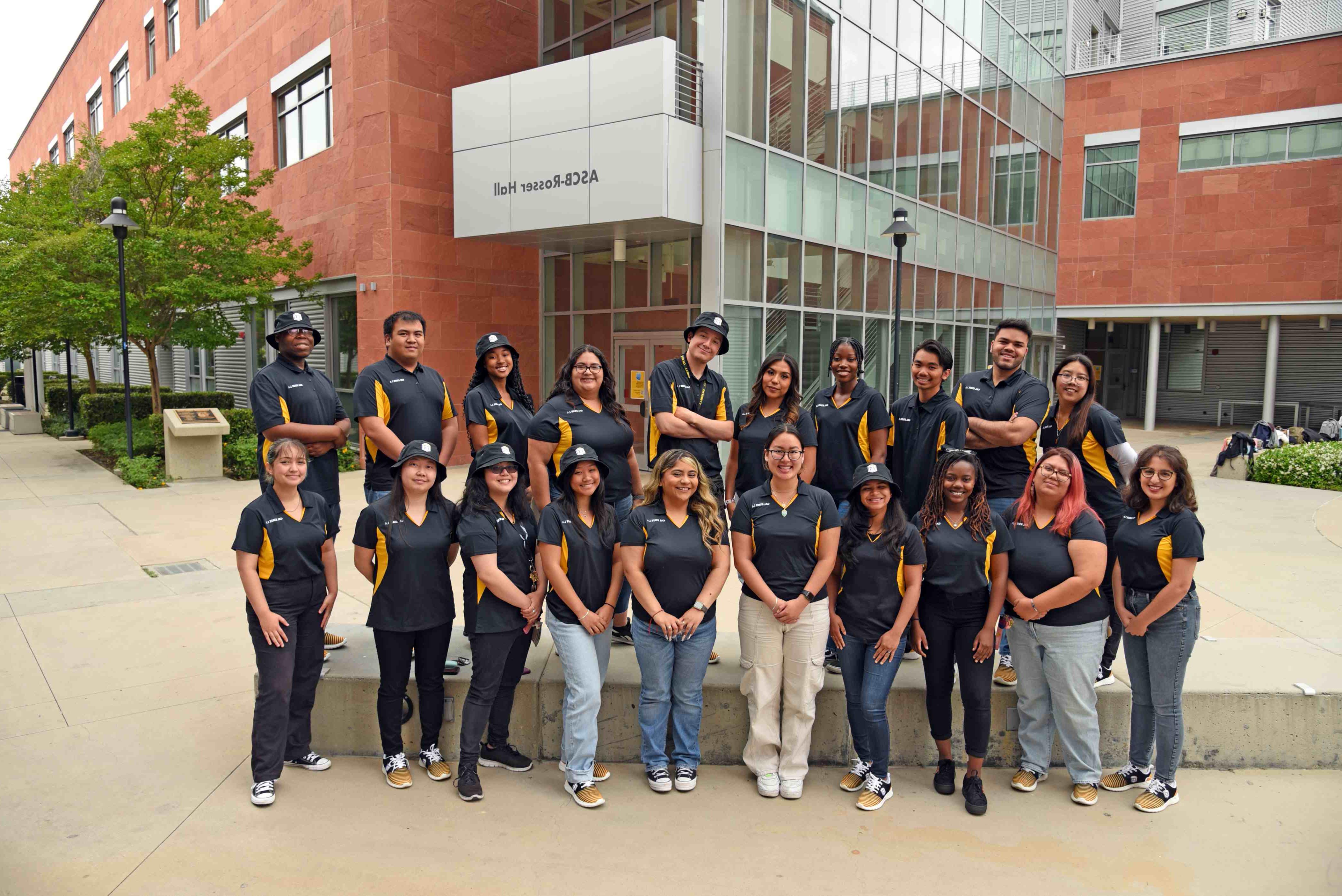 Large group of students in matching shirts 