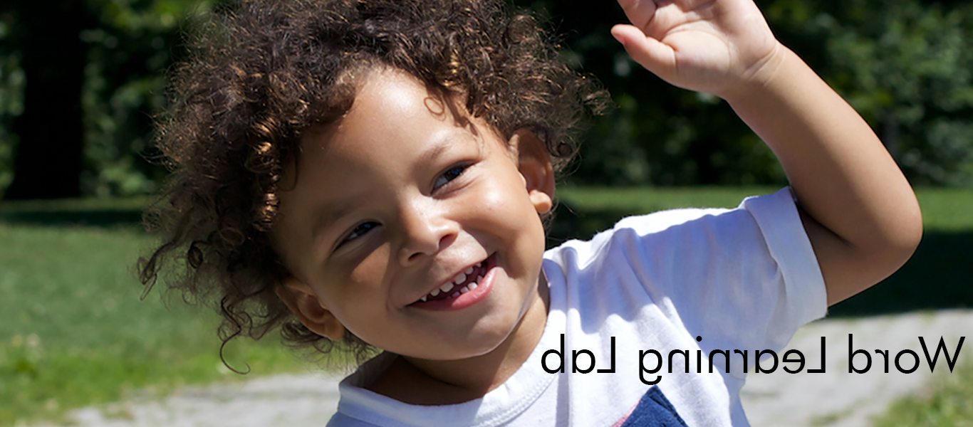 Child smiling playing outside. 