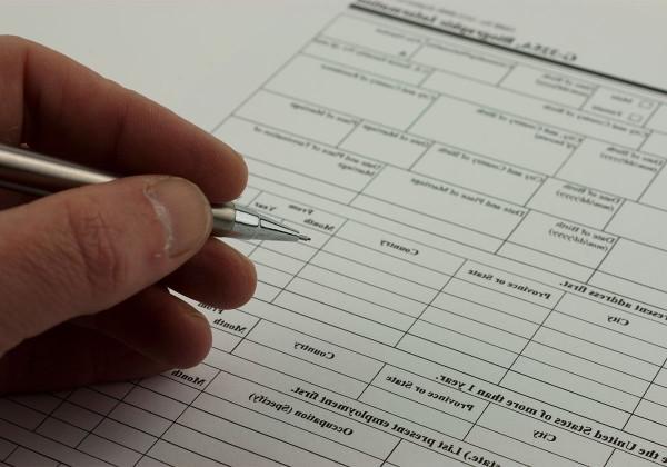 person filling out form