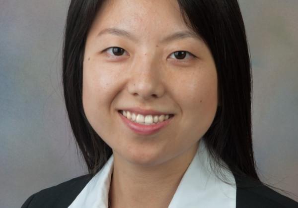 Portrait of a black hair woman smiling. 