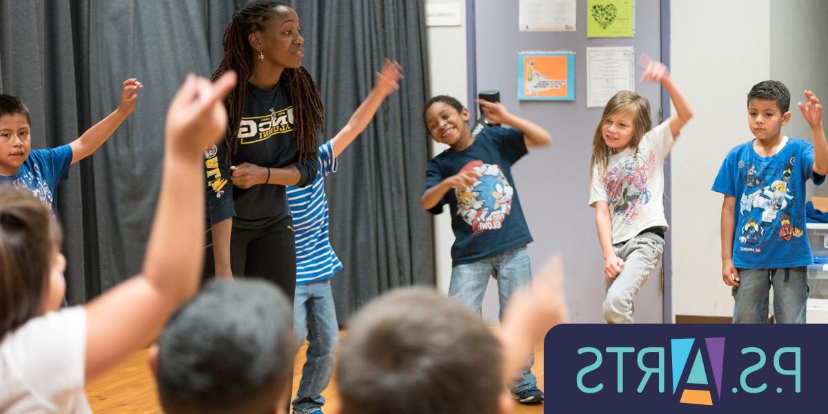 Instructor leading children in movement. P.S. 艺术的标志.