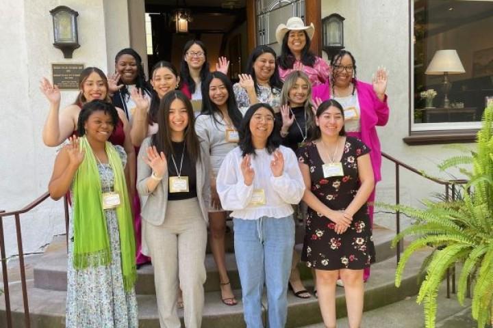 A group of women accepting the Pasadena Scholarship 