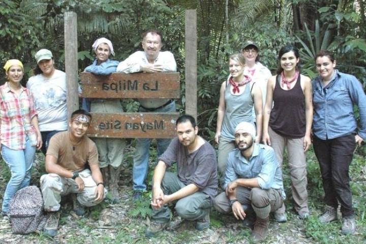 James Brady with students in the field