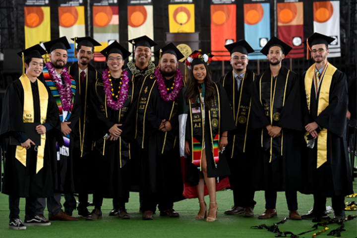 ecst students in cap and gown at commencement