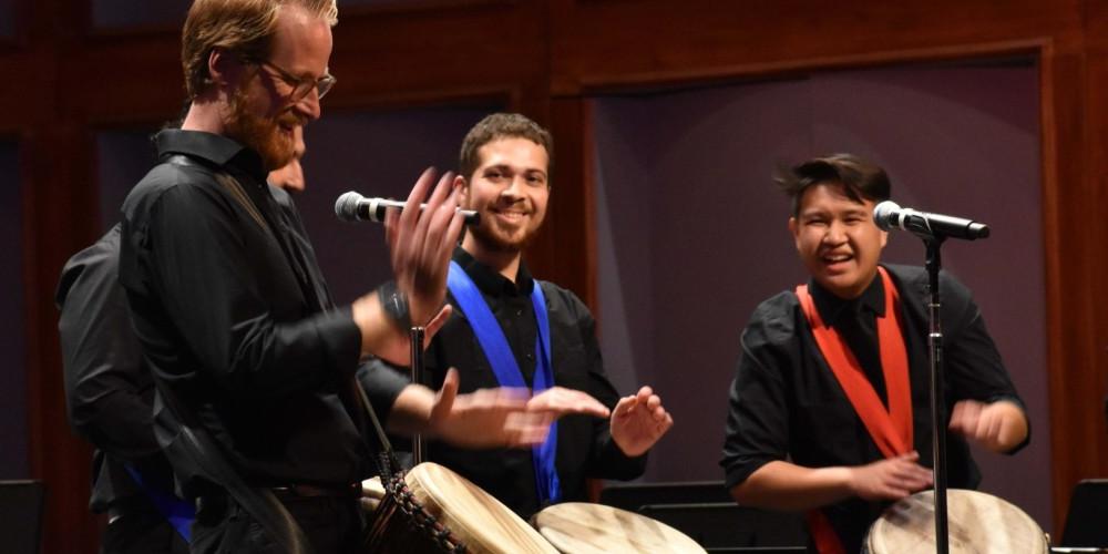 Dr. Adam Snow leading the Percussion Ensemble