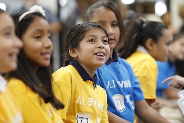 Children in Achieve LA shirts