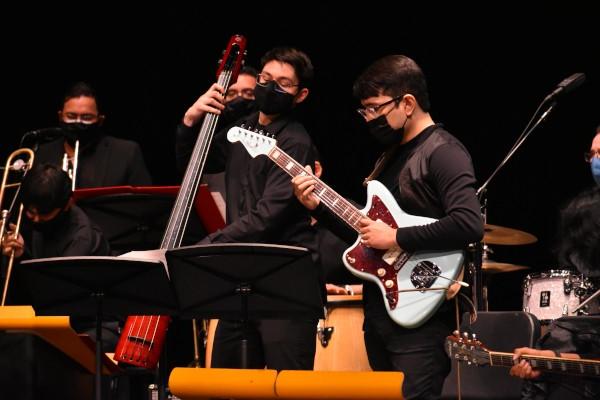 Three students playing in Jazz Big Band