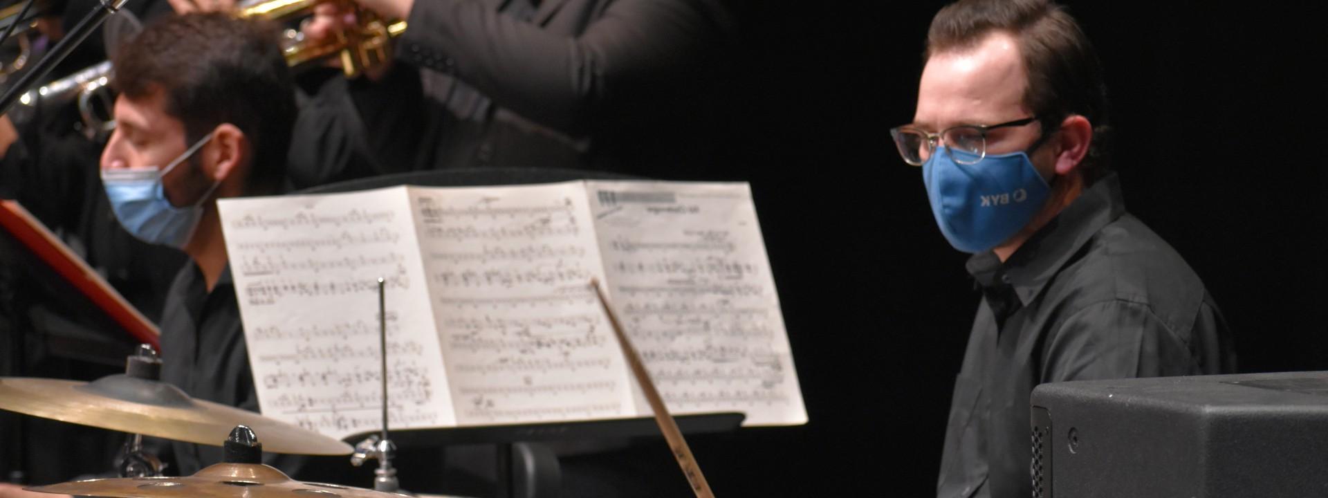 A drumset player playing in Jazz Ensemble