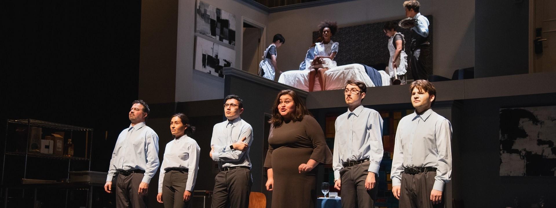 Six cast members downstage and four cast members upstage/above in a scene from "We the Invisibles"