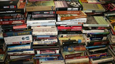 Photo of large stacks of books